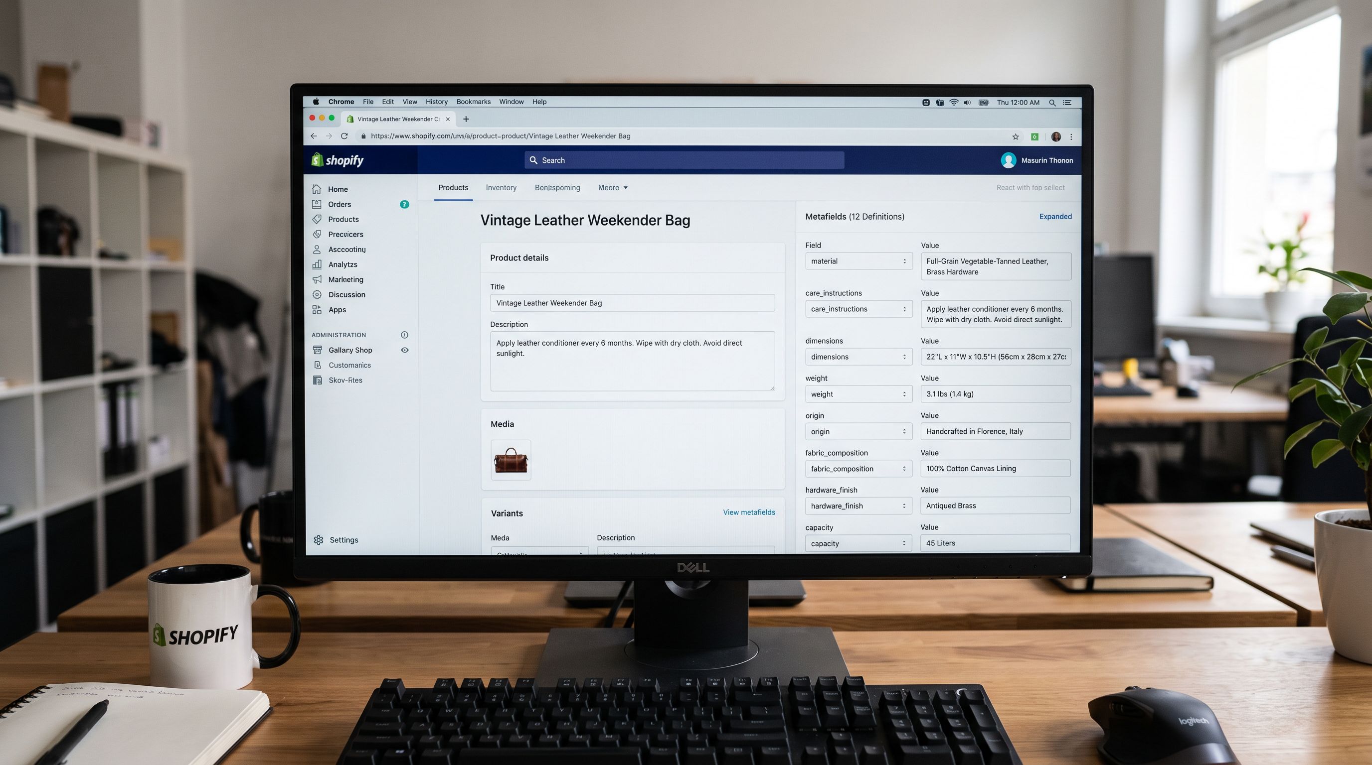 A monitor showing Shopify product admin with a fully populated metafields panel including material, care instructions, and dimensions fields, all with correctly entered values, sharp focus on the screen, colour photography.