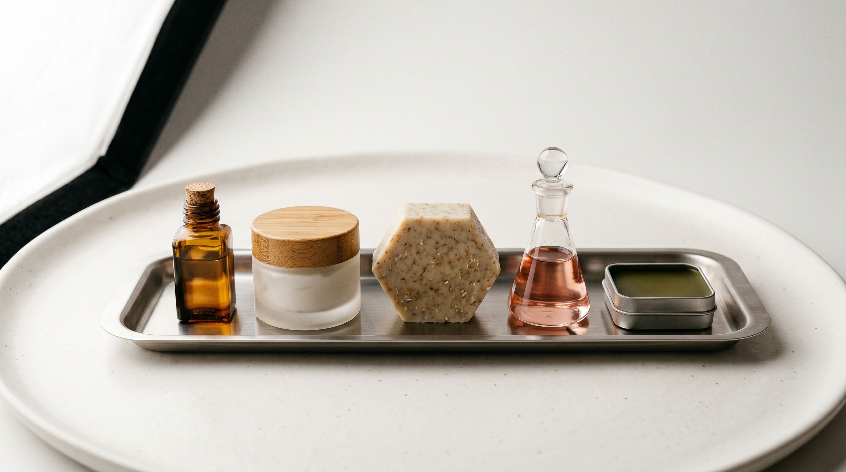 Five product samples arranged in a neat line on a white surface, representing a test import batch.